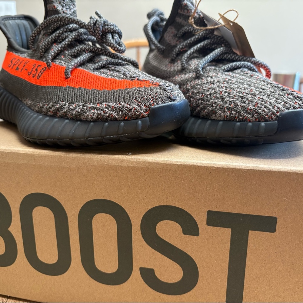 Adidas Black and Orange Sneakers with Boost Technology